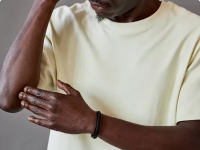 Close-up of a man's neck, revealing redness indicative of eczema, a skin condition